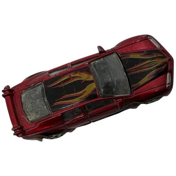 Red Diecast Toy Car with Yellow Flame Decals & Rear Spoiler 1:64 - Picture 6 of 7